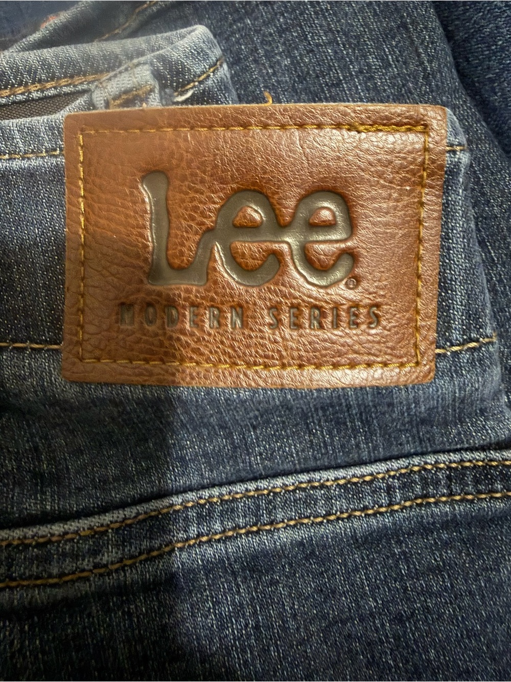 Lee Slim Straight Jeans in Dark Denim with Brown Patch